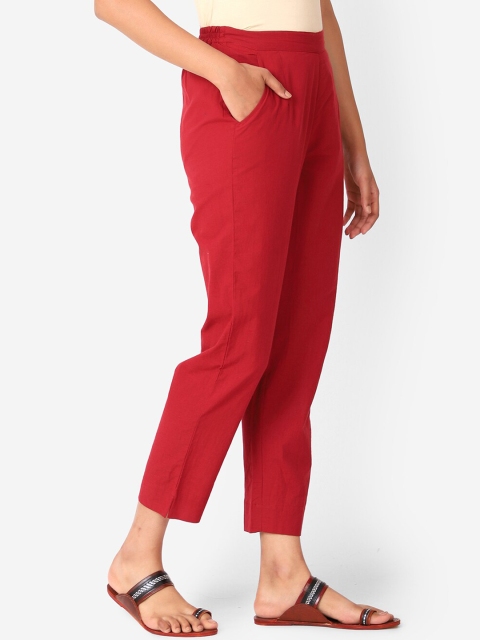 

Fabindia Women Red Solid Tapered Fit Trousers, Maroon