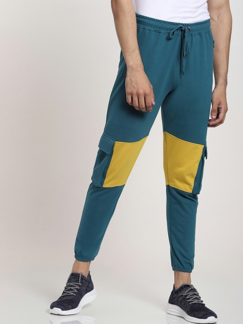 

Bewakoof Men Green Solid Relaxed-Fit Joggers