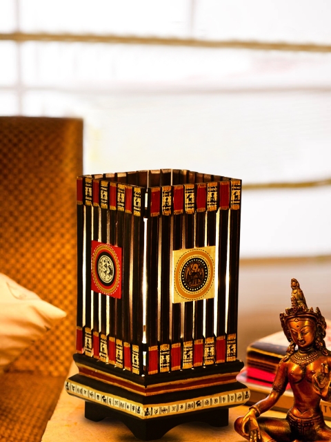 

ExclusiveLane Brown Mango Wood Warli Handpainted Lamp