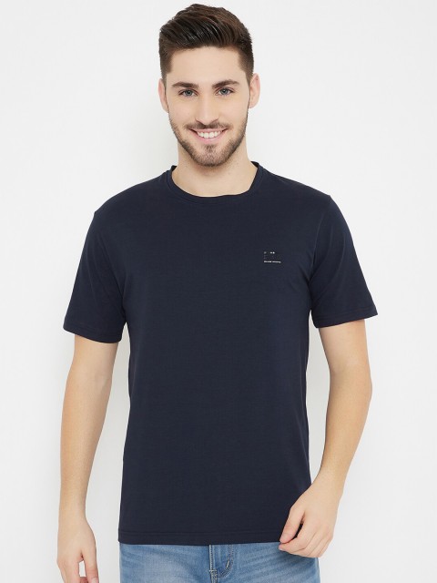 

Okane Men Navy Blue Solid T-shirt