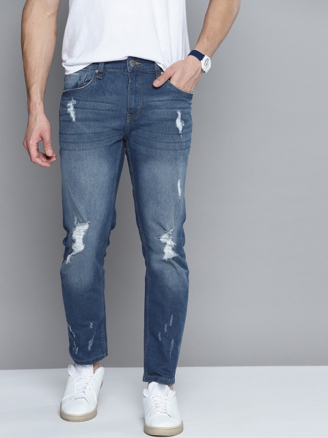 

Mast & Harbour Men Blue Tapered Fit Mildly Distressed Light Fade Stretchable Jeans