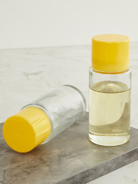 

Home Centre Transparent Set Of 2 Transparent Solid Oil Vinegar Dispenser