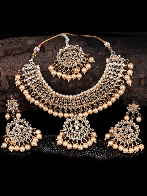 

Mirraw Gold-Plated White Kundan Studded & Beige Beaded Jewellery Set