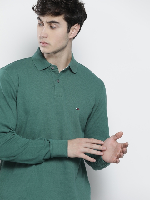 

Tommy Hilfiger Men Teal Solid Polo Collar T-shirt