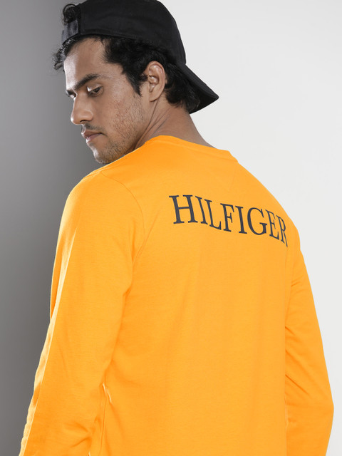 

Tommy Hilfiger Men Mustard Yellow Brand Logo Printed Pure Cotton T-shirt