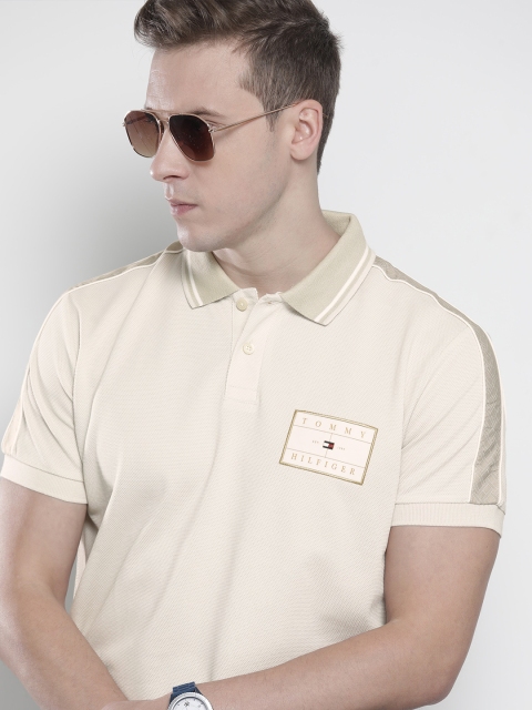 

Tommy Hilfiger Men Beige Self Design Applique Detail Polo Collar T-shirt