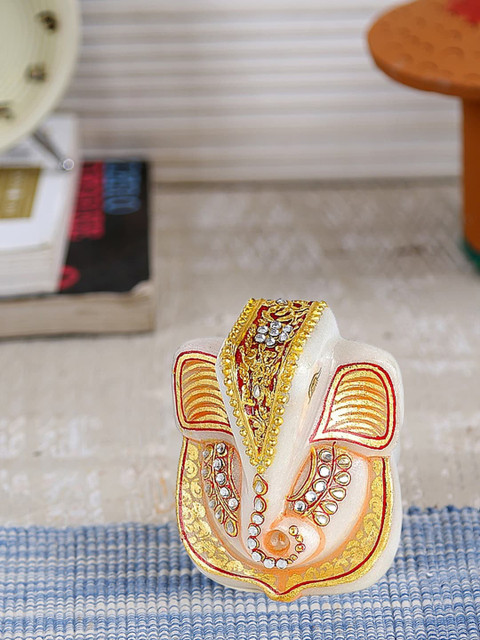 

Aapno Rajasthan White & Gold-Toned Lord Ganesh Showpiece