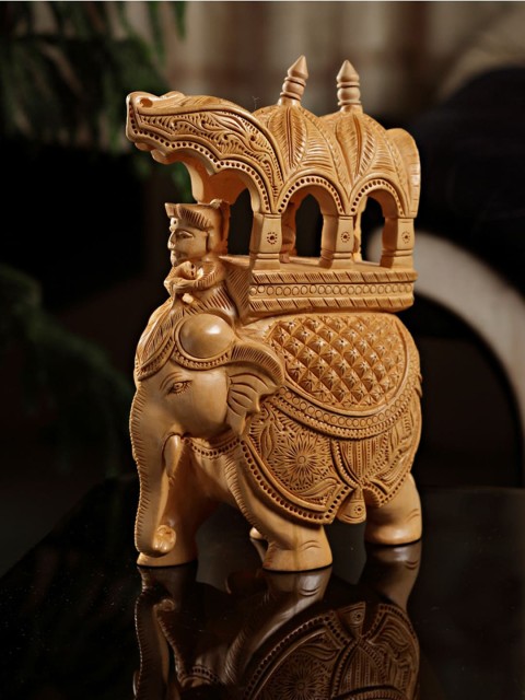 

Aapno Rajasthan Brown Carved Wooden Elephant Statuette Showpiece