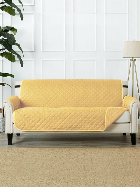

Rajasthan Decor Beige Solid 2 Seater Quilted Cotton Sofa Cover