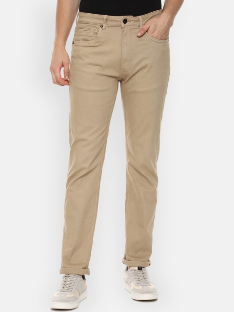 

Louis Philippe Jeans Men Beige Solid Mid-Rise Jeans