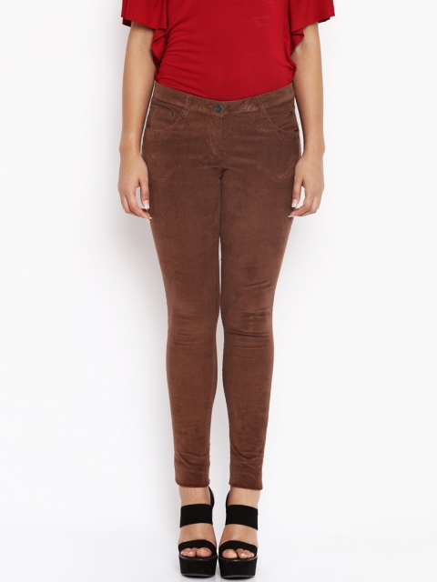 

Park Avenue Women Brown Regular Fit Self Design Regular Trousers