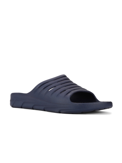 

Bata Men Blue Self Design Sliders