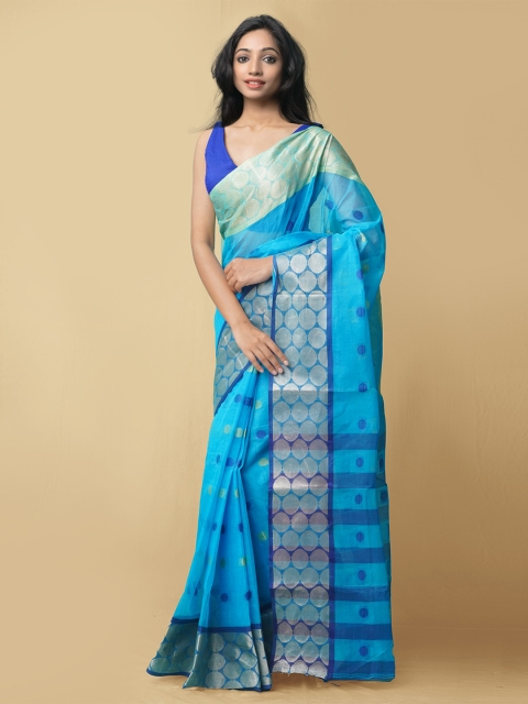 

Unnati Silks Women Blue Woven Design Printed Cotton Saree