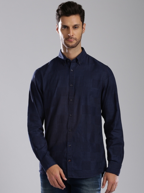 

Tommy Hilfiger Men Navy Blue Solid Casual Shirt