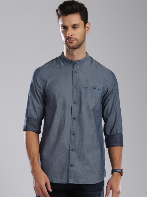 

Tommy Hilfiger Men Navy Blue Slim Fit Solid Casual Shirt