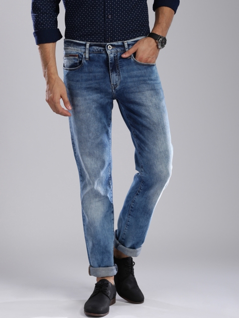 

Tommy Hilfiger Men Blue Mid-Rise Clean Look Jeans