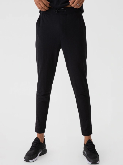 

DAMENSCH Men Black Solid Joggers