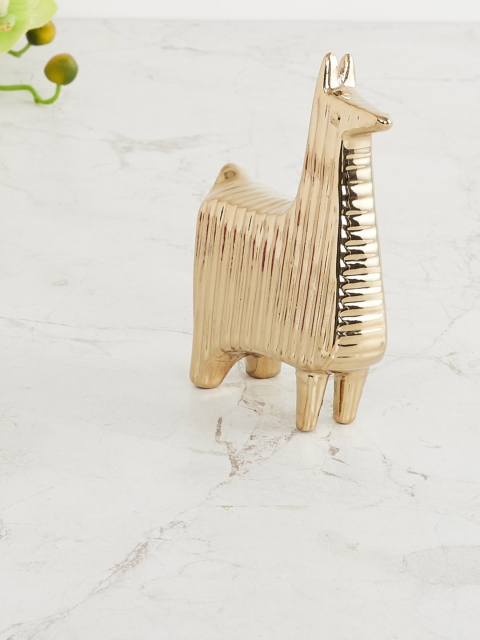 

Home Centre Gold-Toned Stoneware Lama Figurine