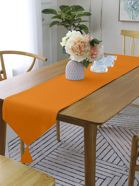 

Lushomes Orange Solid Cotton Rectangular Table Runner