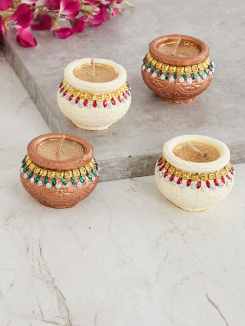 

Home Centre Set Of 4 Utsav Embellished Multicolour Wax Diyas, Multi