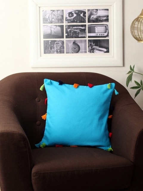 

Lushomes Blue Solid Cushion Covers with Colorful Tassels