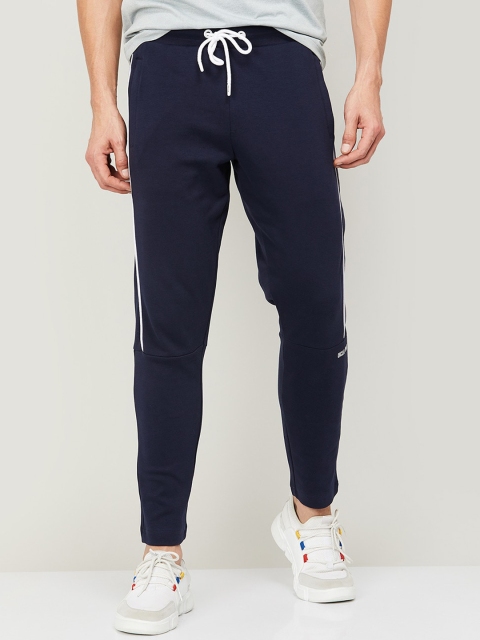 

UCLA Men Navy Blue Solid Side Striped Slim-Fit Cotton Track Pants