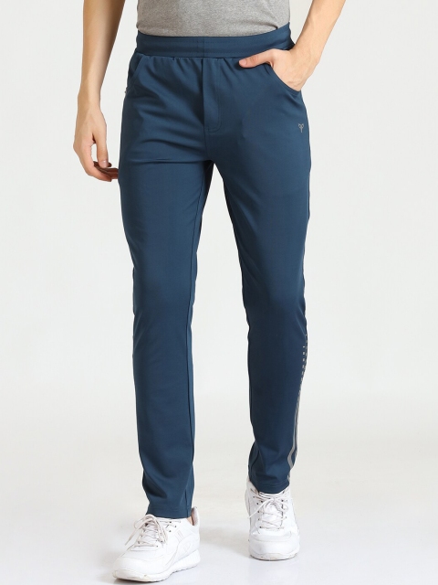 

POKER ACTIVE Men Blue Solid Track Pants