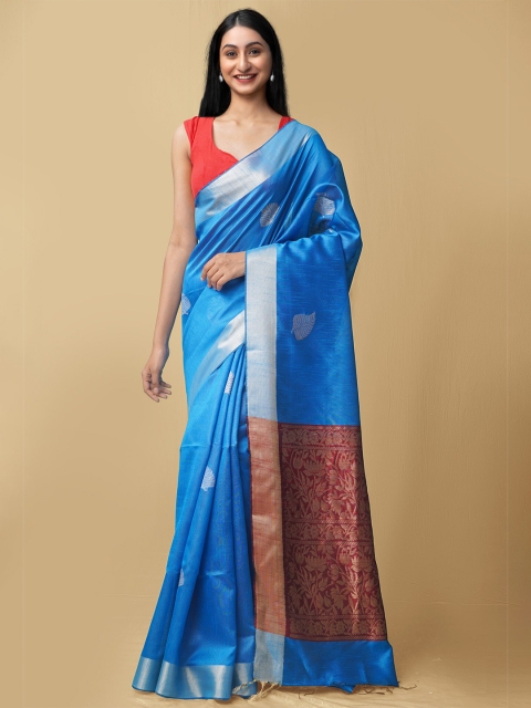 

Unnati Silks Blue & Silver Ethnic Motifs Zari Linen Blend Jamdani Saree