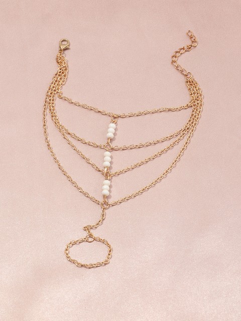 

URBANIC Women Gold-Toned & White Beaded Link Finger Ring Bracelet