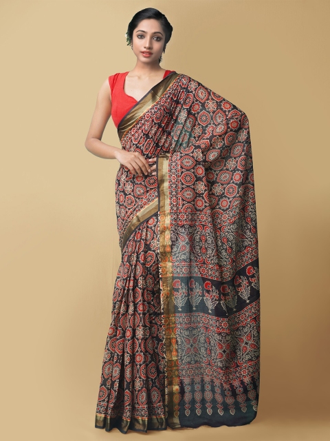 

Unnati Silks Black & Red Floral Zari Pure Ajrakh Mulmul Cotton Dabu Saree