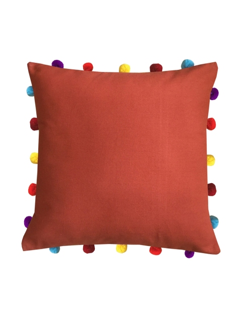 

Lushomes Metallic Orange Square Cushion Covers With Colorful pom poms