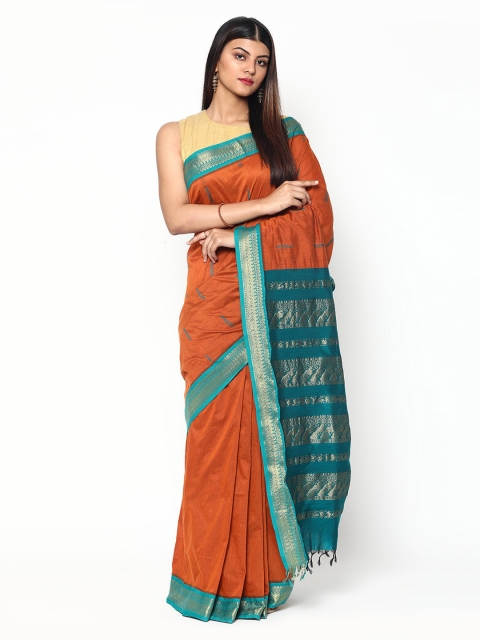 

Sudarshan Silks Orange & Teal Warli Zari Silk Cotton Saree