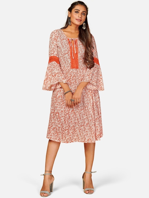 

Vbuyz Women Orange Floral Printed Flared Sleeves Kurta