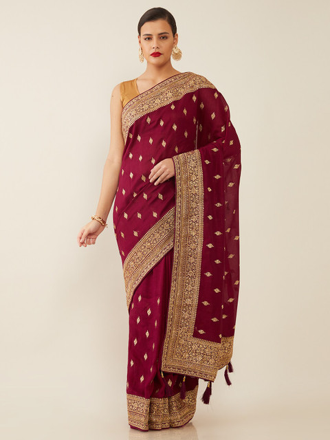 

Soch Maroon & Gold-Toned Ethnic Motifs Beads and Stones Heavy Work Saree
