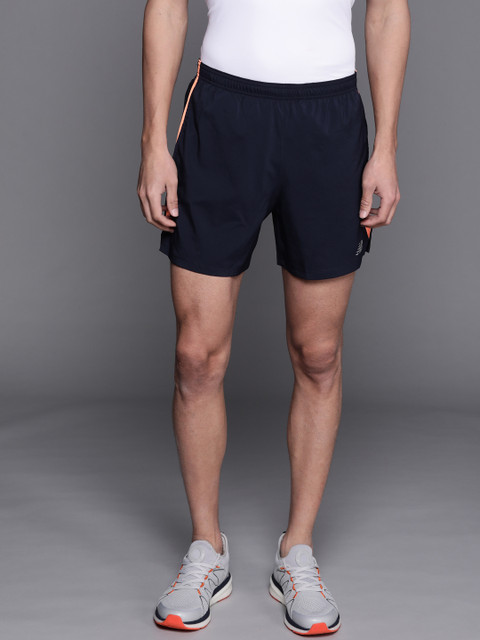 

New Balance Men Navy Blue Solid High-Rise Sports Shorts