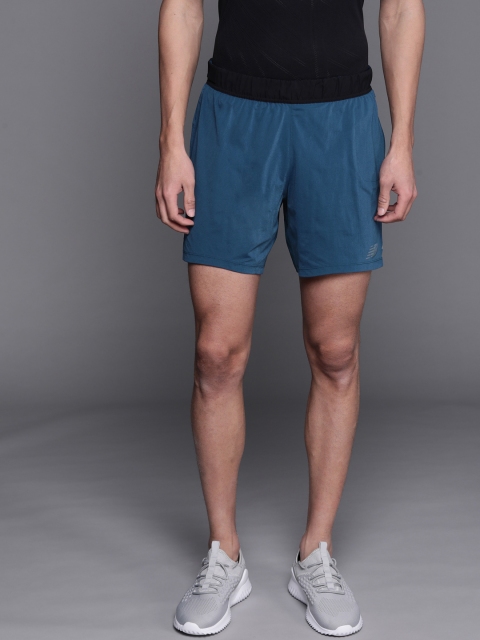 

New Balance Men Blue Solid High-Rise Sports Shorts