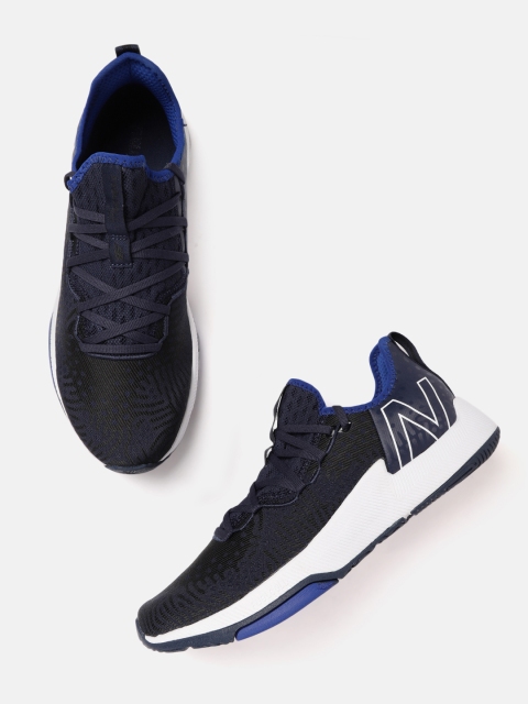 

New Balance Men Navy Blue & Black Woven Design FC Training Shoes