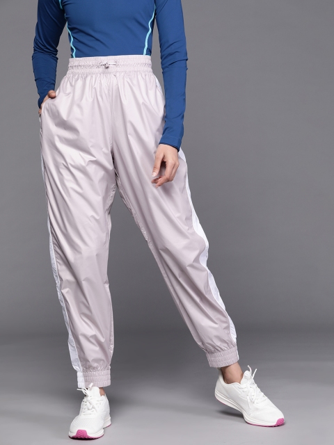 

New Balance Women Grey Solid Relaxed Fit Sports Joggers with Side Stripes