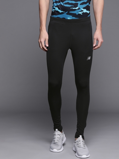 

New Balance Men Black Solid Tights with Printed Detail