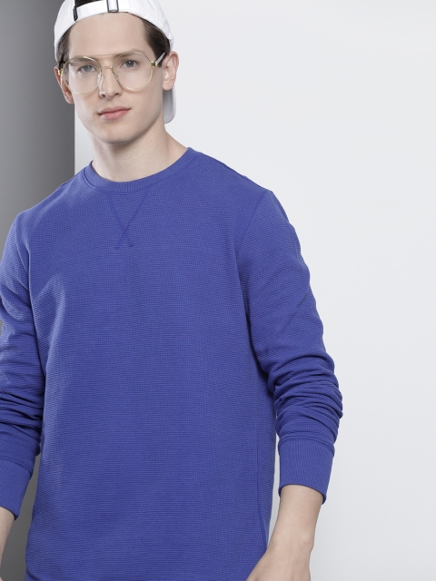 

Tommy Hilfiger Men Blue Solid Pure Cotton T-shirt