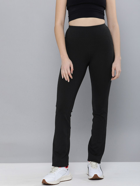 

Skechers Women Black Solid Track Pants