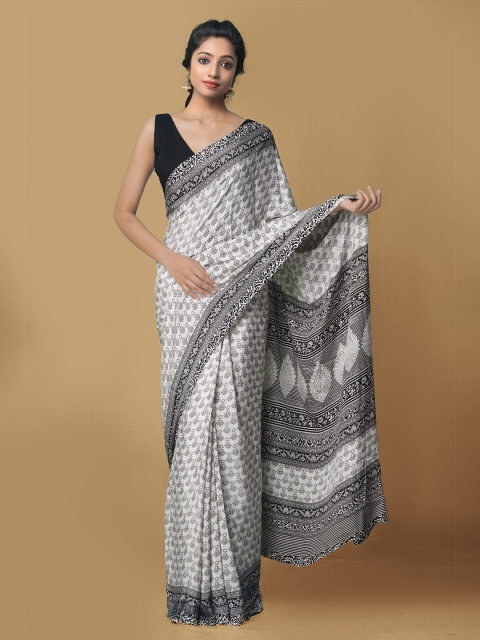 

Unnati Silks White & Black Printed Crepe Art Silk Patola Saree