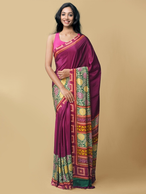 

Unnati Silks Purple & Green Ethnic Motifs Art Silk Patola Saree