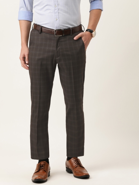 

Peter England Men Brown Carrot Fit Formal Trousers