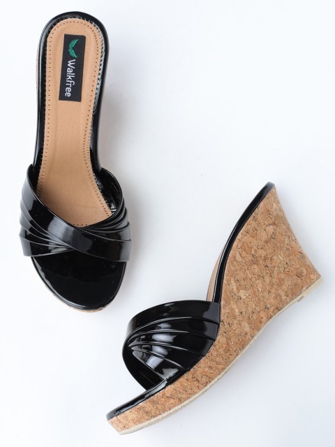 

Walkfree Women Black Solid Wedges