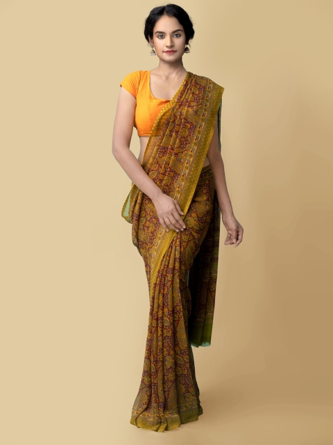 

Unnati Silks Maroon & Mustard Ethnic Motifs Saree