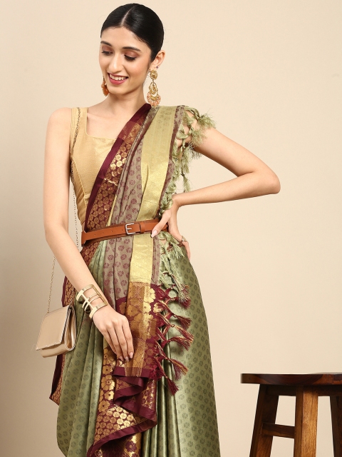 

Anouk Green Ethnic Motifs Zari Pure Silk Banarasi Saree