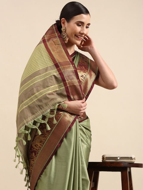 

Anouk Green Zari Pure Silk Banarasi Saree