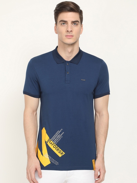 

V2 Value & Variety Men Navy Blue Typography Printed Polo Collar Cotton T-shirt