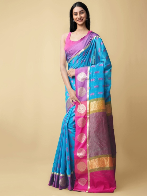 

Unnati Silks Blue & Fuchsia Ethnic Motifs Zari Silk Cotton Mysore Silk Saree